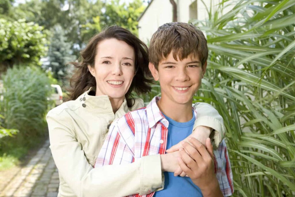 Mother hugging her son