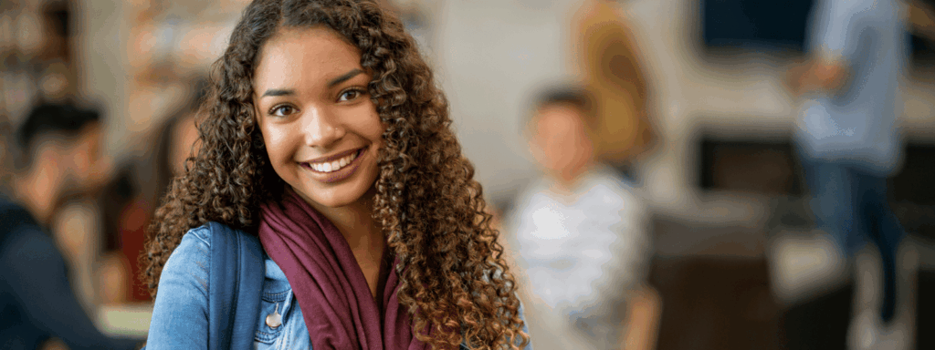 Image of young woman smiling at the camera