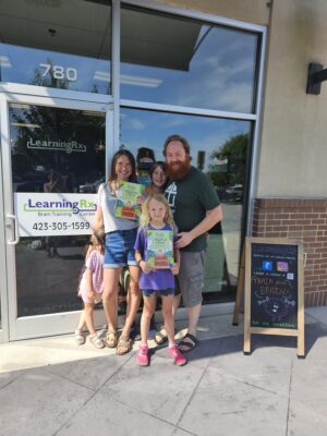 Author of Polly and the Magical Chest and her family