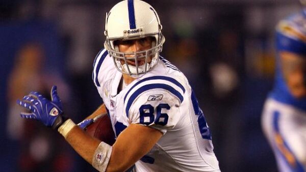 Image of past LearningRx client and football player with a TBI
