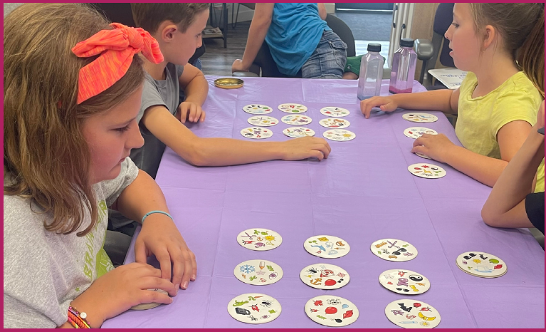 Children playing Spot It as a cognitive activity in Columbus