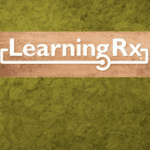 Boxwood Green wall with the LED LearningRx logo sign