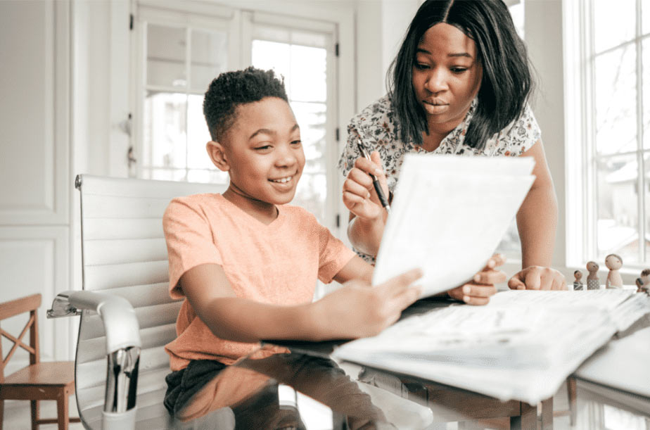 student and tutor in Sugar Land working on homework together